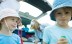 ©Sigrid Olsson/AltoPress/Maxppp ; Children standing in front of trunk of car